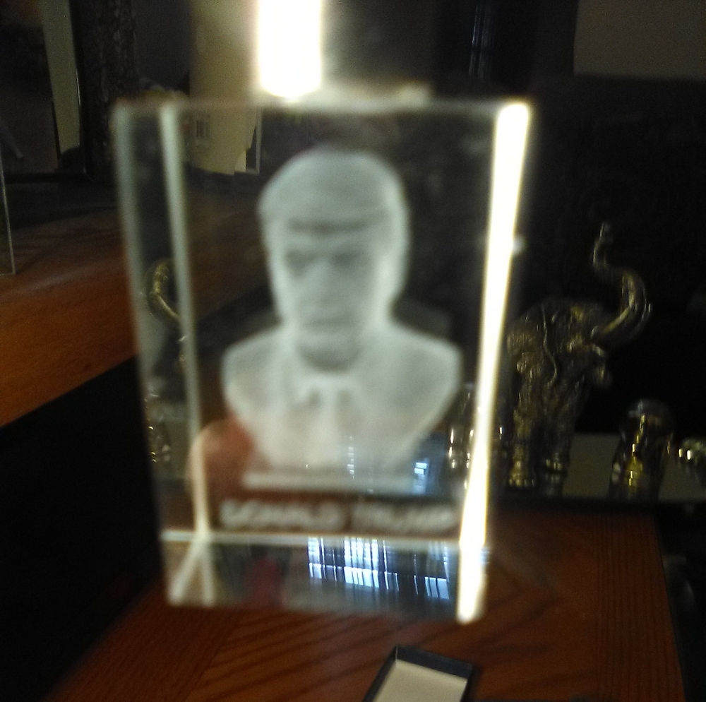 Donald Trump holographic keychain.